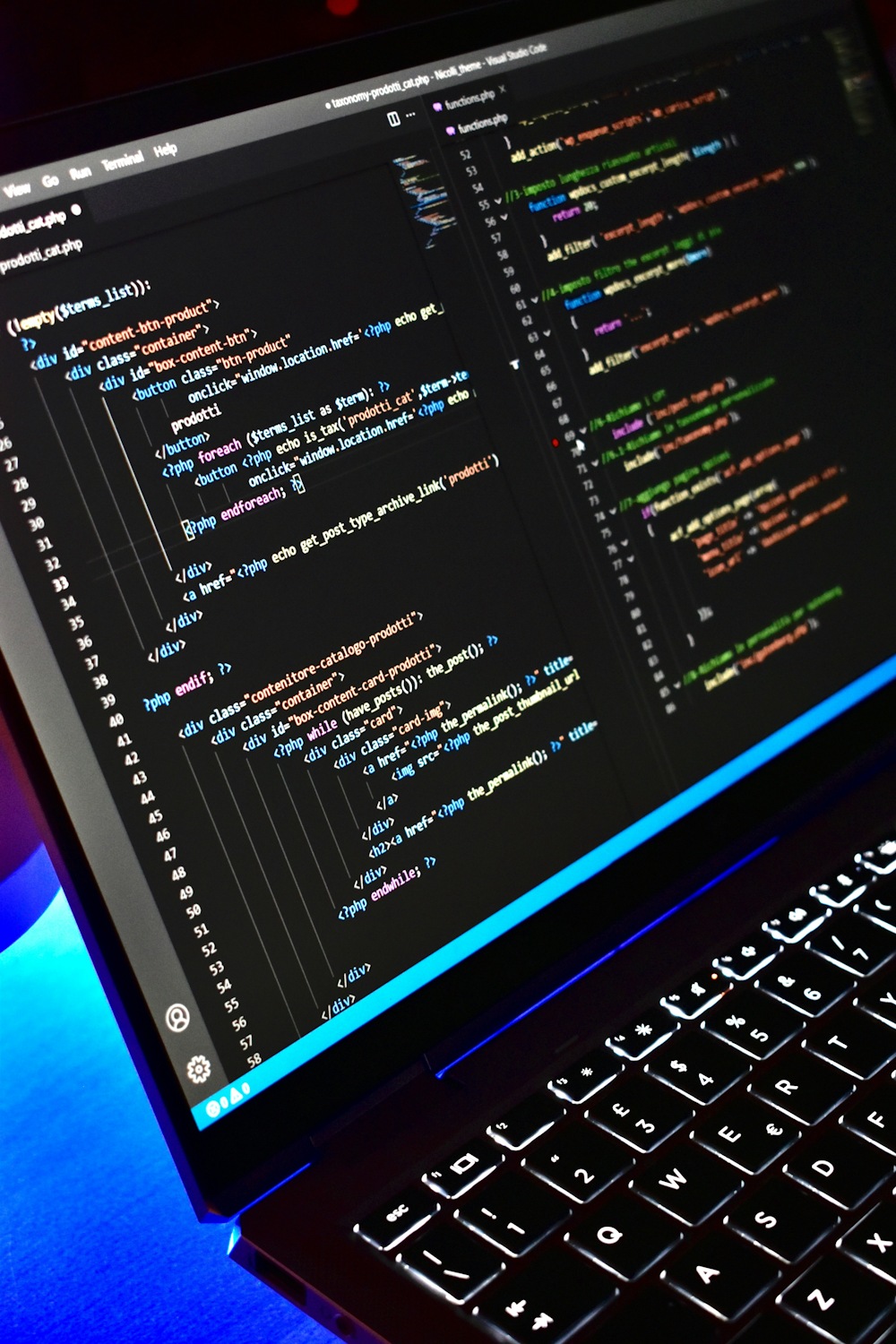 Laptop displaying code in a remote development workspace